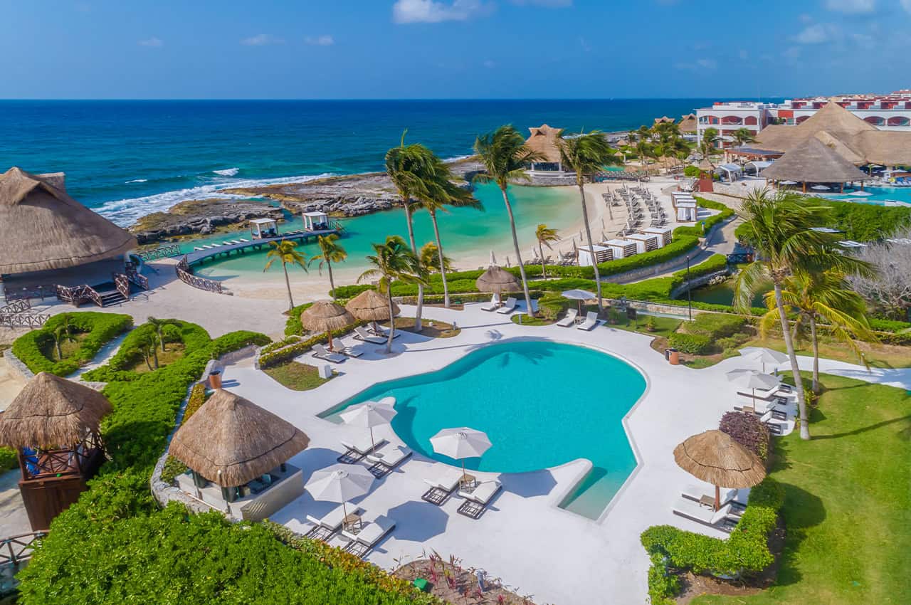 Hard Rock Hotel Riviera Maya all-inclusive resort complex with pools and tropical beachfront setting in Mexico.