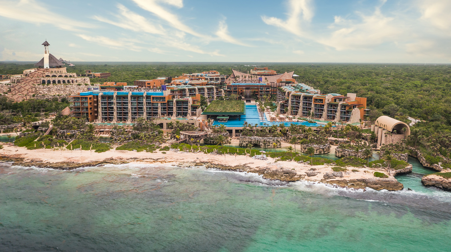 Hotel Xcaret Arte all-inclusive resort in Riviera Maya Mexico with eco-luxury design and resort pools.